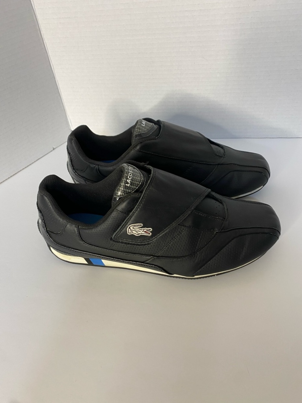 Lacoste Black Slip-On Sneakers with Blue and White Trim